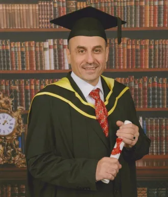 Photo of Munir at his graduation 